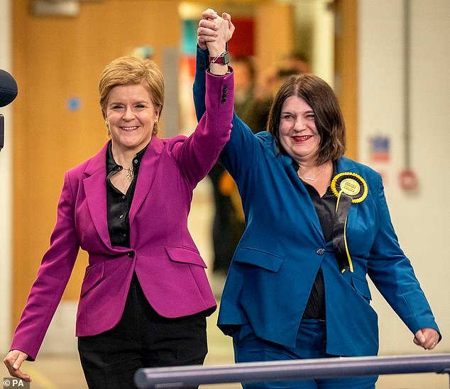 101333745-15011879-Glasgow_s_council_leader_Susan_Aitken_right_said_she_was_proud_o-m-10_1755546058087.jpg