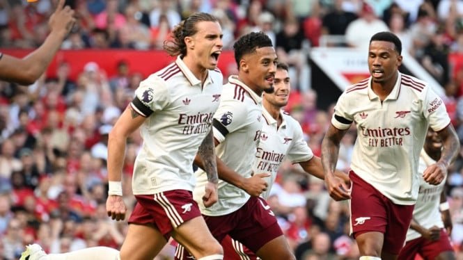 68a21099ca866-pemain-arsenal-merayakan-gol-ke-gawang-mu_665_374.jpeg