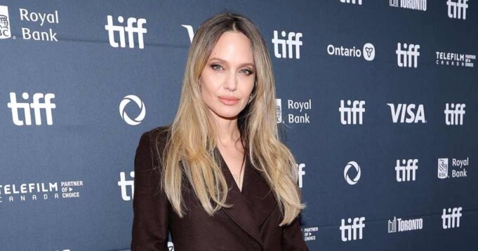 Feature-Angelina-Jolie-Stuns-on-the-Red-Carpet-as-She-Recreates-Viral-Leg-Moment-at-the-Toronto-Film-Festival.jpg