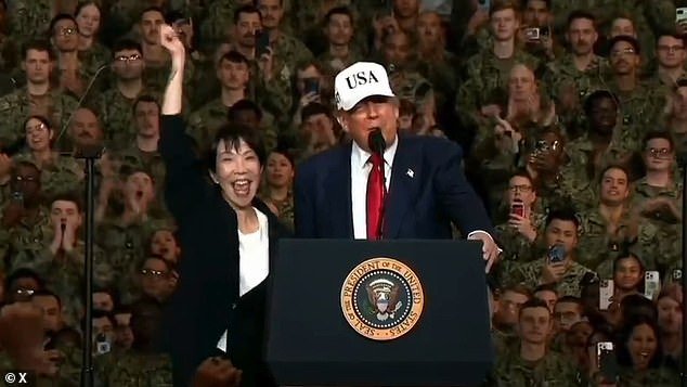 103376259-15233431-Japanese_Prime_Minister_Sanae_Takaich_jumped_for_joy_and_pumped_-m-13_1761656085915.jpg