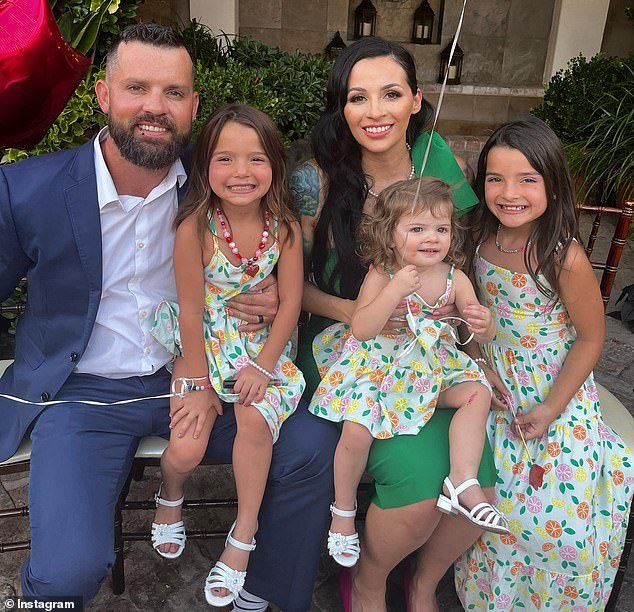 87415721-15195695-The_disgraced_dad_traveled_with_his_wife_Erika_Scholtes_who_has_-a-7_1760551279636.jpg
