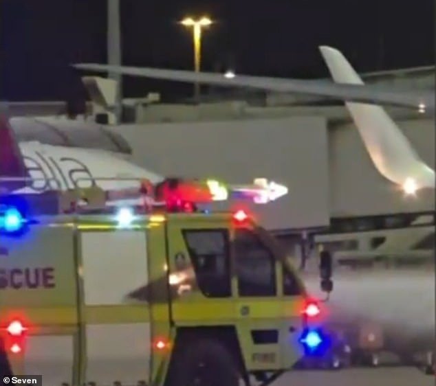 103664759-15266989-The_brakes_of_a_plane_at_Brisbane_Airport_caught_fire_after_touc-m-1_1762460717799.jpg