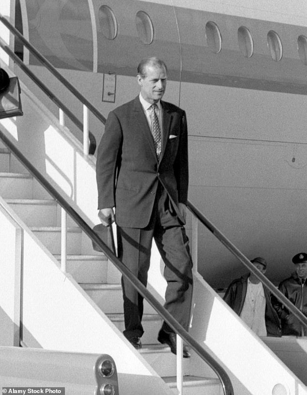 103714405-15272595-The_Duke_of_Edinburgh_Prince_Philip_descends_the_stairs_of_an_ae-m-12_1762631585940.jpg