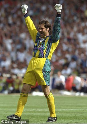 104101511-15316047-Football_thrills_David_Seaman_celebrates_while_playing_for_Engla-m-3_1763890565747.jpg