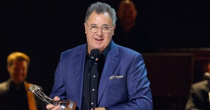 Vince-Gill-accepts-the-Lifetime-Achievement-Award-onstage-during-the-59th-Annual-CMA-Awards-2247564690.jpg