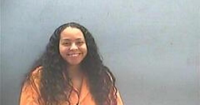 woman-smiles-arrested-beat-up-pregnant-woman.jpg