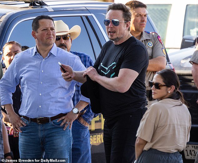 102731655-15557283-Gonzales_and_Aviles_are_pictured_with_Elon_Musk_in_Texas_in_Sept-a-34_1771018271945.jpg