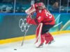 Los Juegos Olímpicos de Invierno cambian los tableros de hockey sobre hielo a colores más claros debido a las preocupaciones de los jugadores